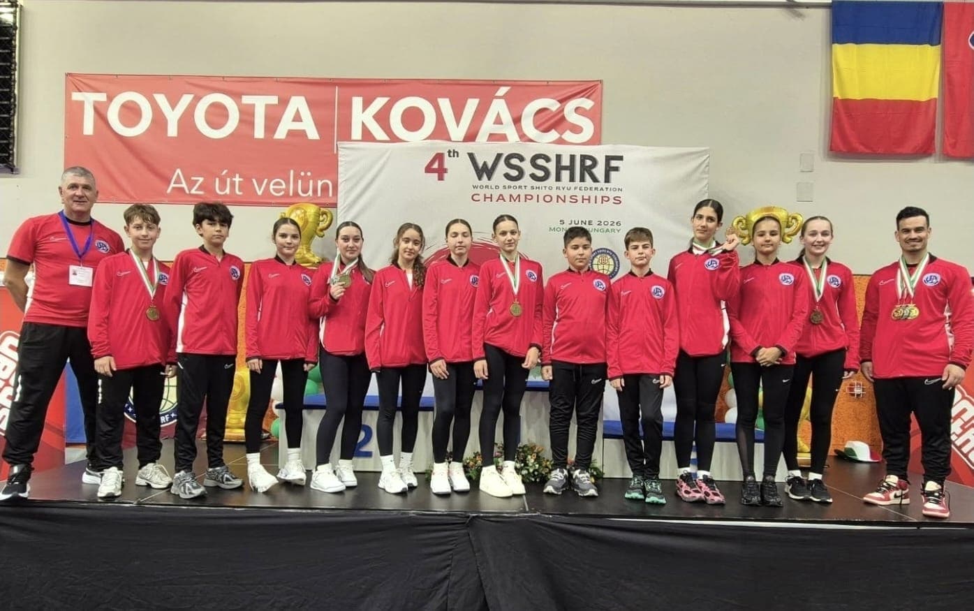 Elite Karate Club members training together in a dojo